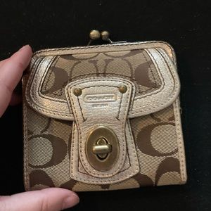 Tan and cold coach wallet
